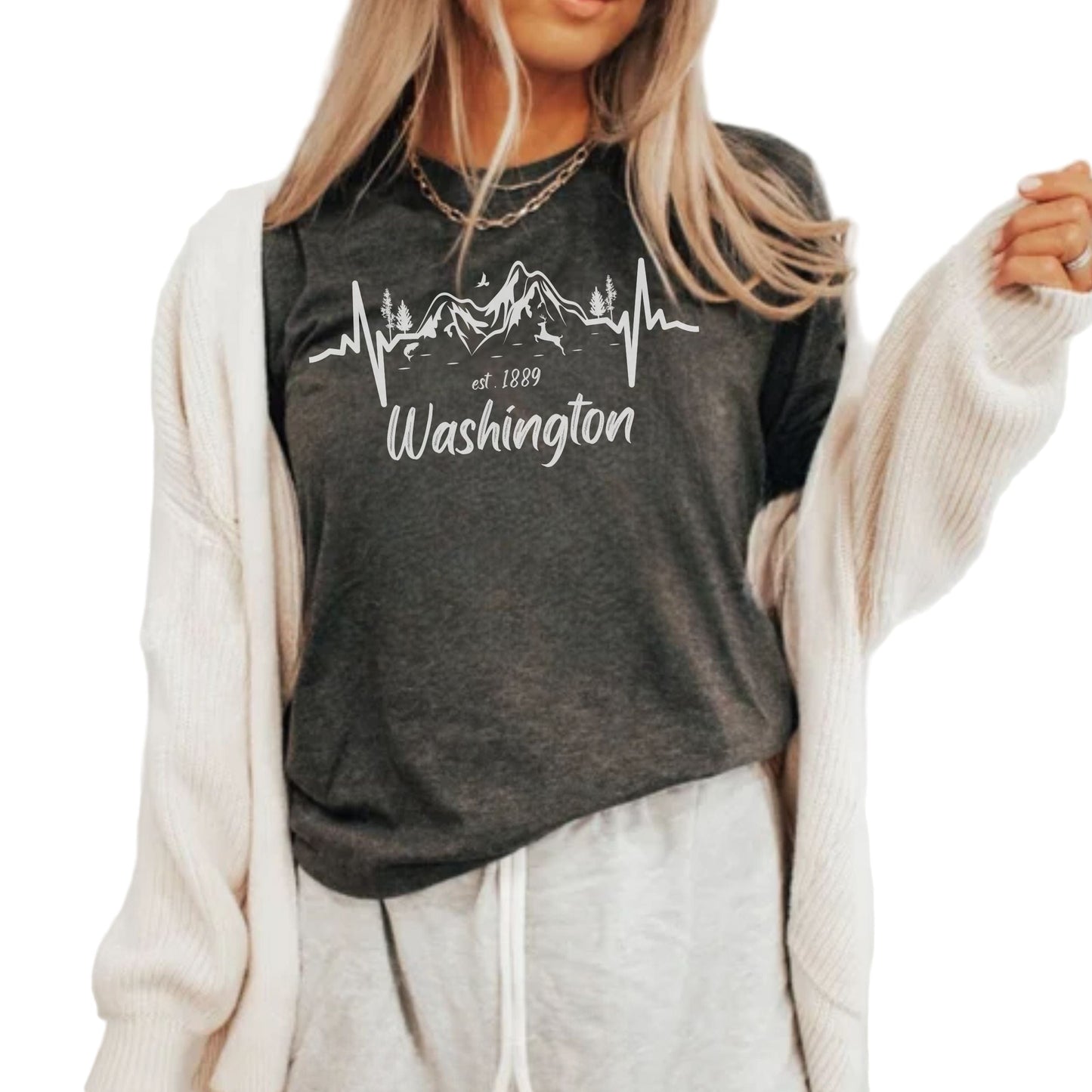 Person wearing a dark gray Tshirt with 'Washington' and a mountain design.